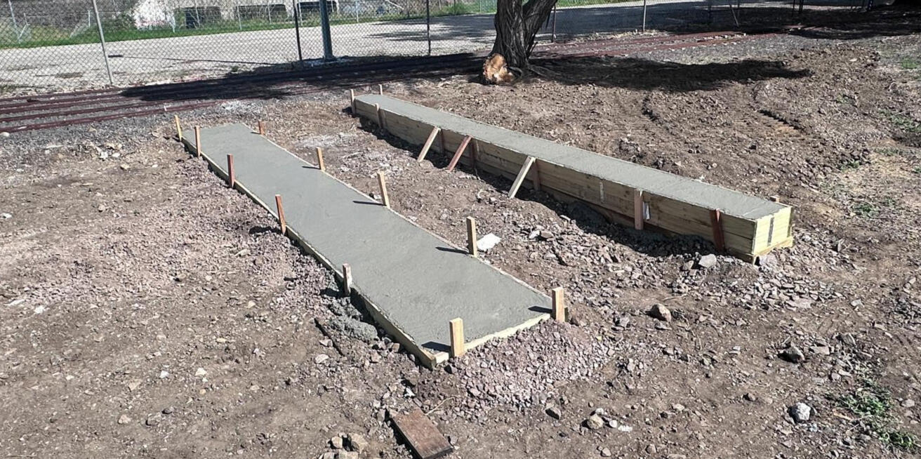 Freshly poured concrete walkway and retaining slab in progress – Noosa QLD